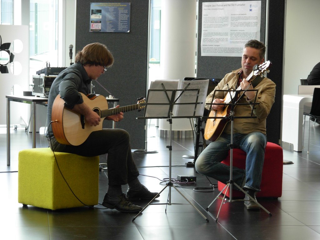 Alan Williams and Haftor Medbøe performing in the lobby at the end of Friday's sessions.